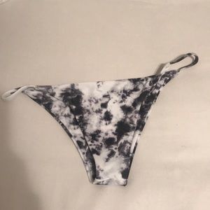 Kittenish cheeky bikini bottom